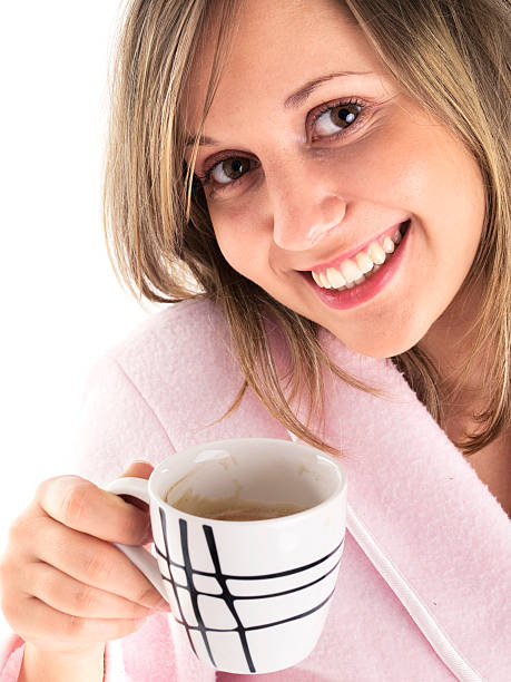istock Woman in housecoat with coffee 179112368