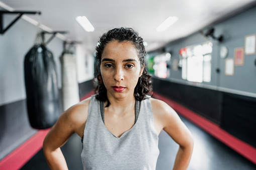 Portrait of a mid adult woman at boxe gym