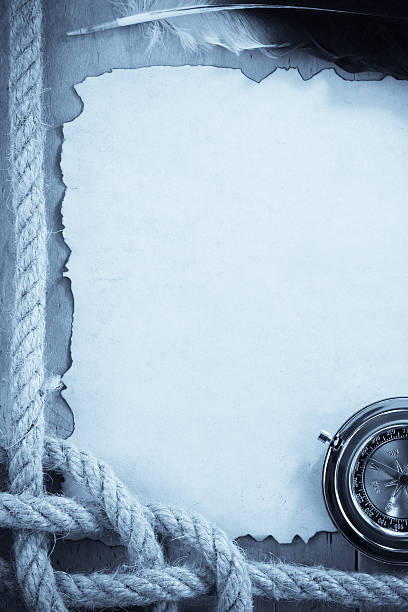 istock ropes and compass on old vintage ancient paper background 179113114