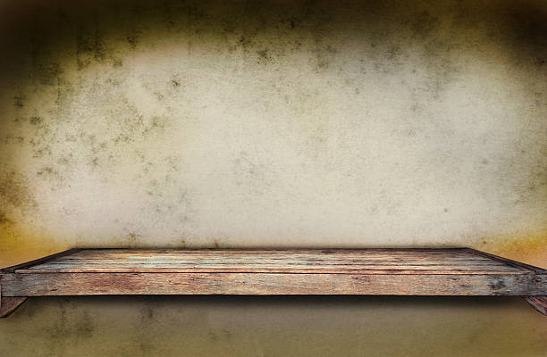 istock old wood shelf on grungy wall 179113224