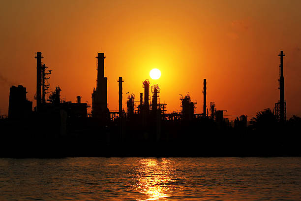 istock Oil refinery at sunrise 179113295