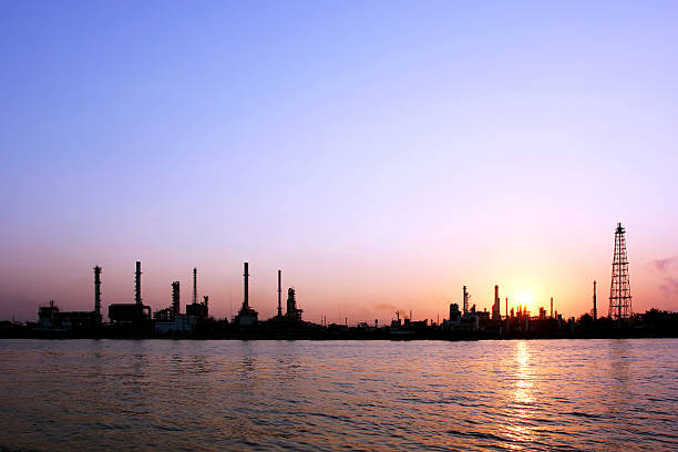 istock Oil refinery at sunrise 179113399