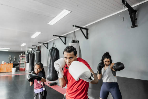 istock Instructor training boxing or muay thai with students at gym 1791134193