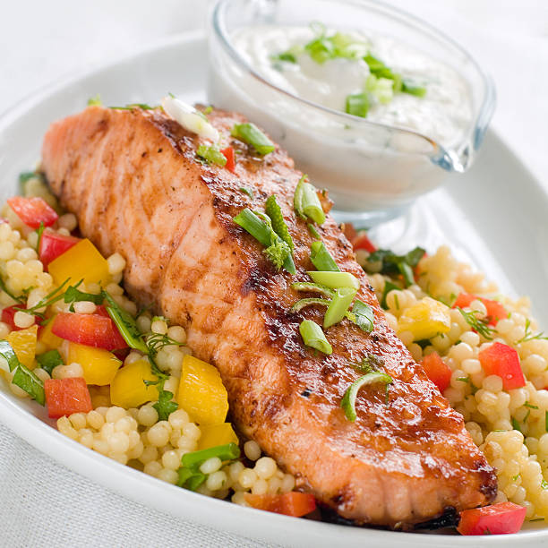 istock grilled salmon with couscous 179113485