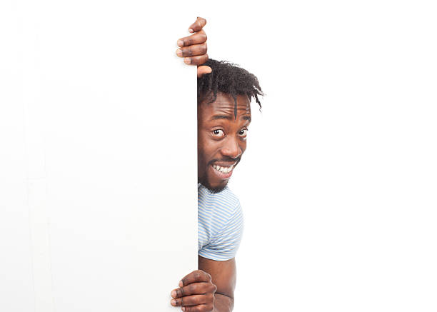istock Cheerful man with blank signboard 179113512