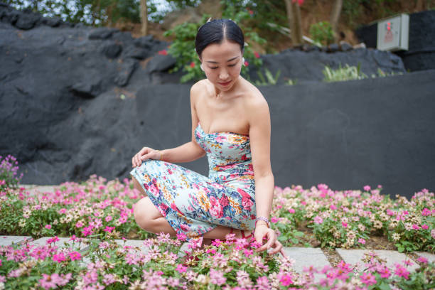 Women Appreciating Flowers