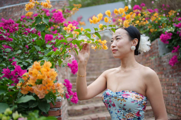A woman picking flowers