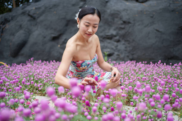 Women Appreciating Flowers