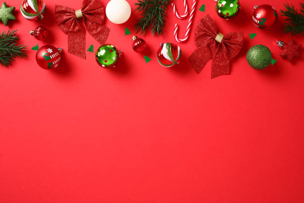 istock Elegant Christmas composition. Chic red background adorned with glittering balls, creating a luxurious and modern aesthetic. Perfect for holiday cards, invitations, and seasonal celebrations 1791143663