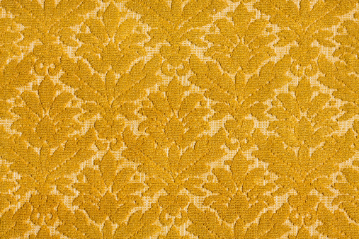 antique fabric textile background of yellow flowers