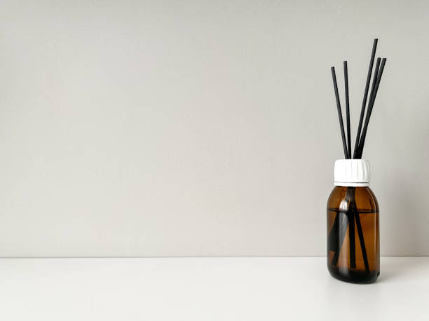 istock Aroma diffuser on the table, near a gray wall, space for text. Interior decor, aromatic air freshener, incense 1791148713