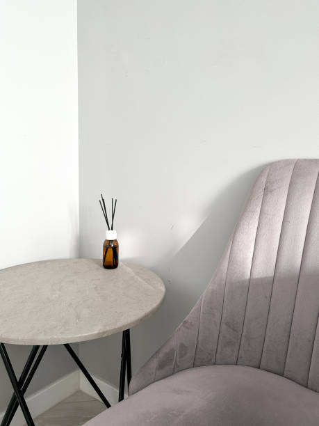 istock Aroma diffuser on the table, near a gray wall, space for text. Interior decor, aromatic air freshener, incense 1791148714