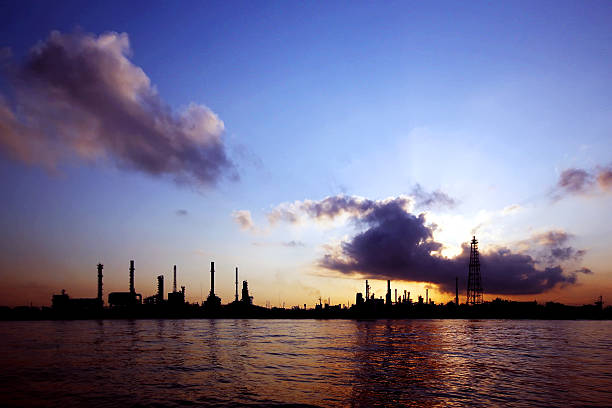 istock Silhouette of oil refinery 179115388