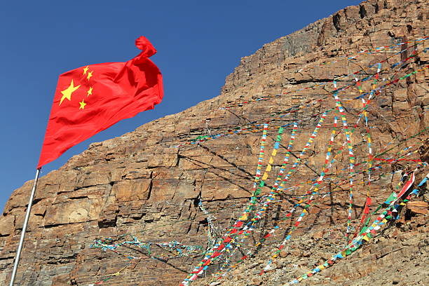 istock Chinese flaf and buddhist prayer flags 179115631