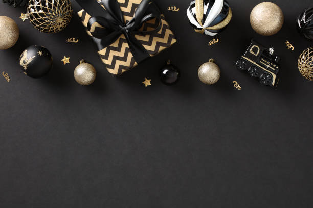 istock Stylish Christmas flat lay composition with golden gift boxes, baubles, confetti, chic decor. Modern holiday concept in a luxurious flat lay design. Ideal for greeting cards, invitations 1791157226