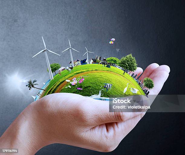 Hand Holding A City Stock Photo - Download Image Now - Sustainable Lifestyle, Globe - Navigational Equipment, Green Color