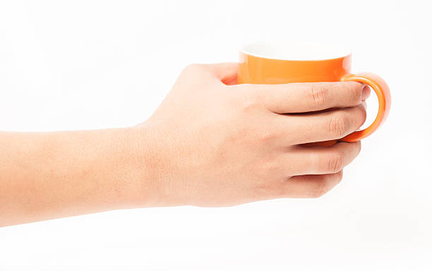 istock Man holding a cup of coffee 179116636