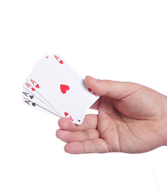 istock man and playing cards in hand 179117294