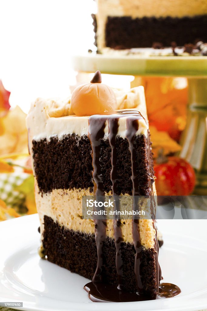 Pumpkin cake Chocolate pumpkin cake with caramel buttercream for Thanksgiving. Cake Stock Photo