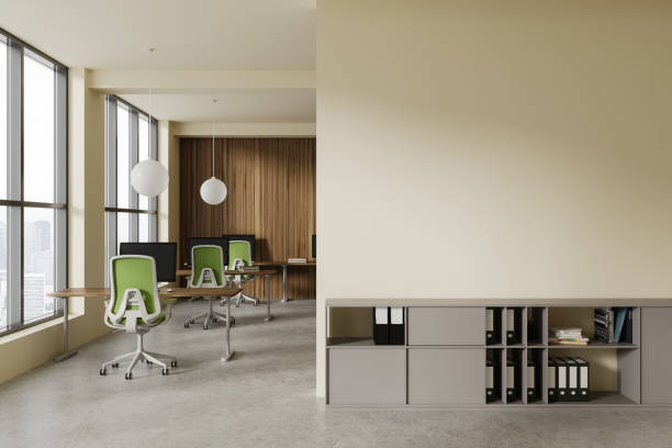 istock Yellow and wooden open space office with blank wall 1791179282