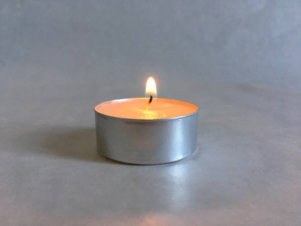 istock Bright flame of a wax candle 1791180439
