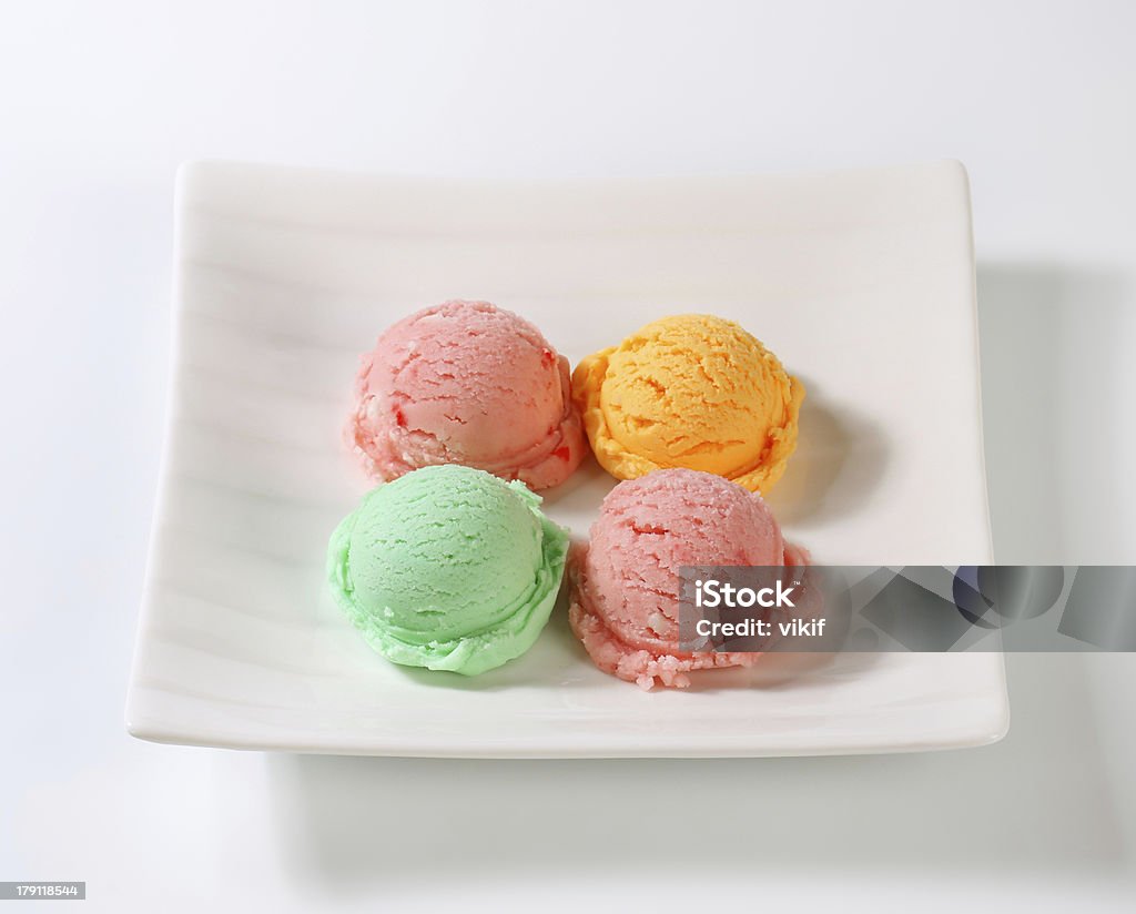 Ice cream scoops on plate Scoops of ice cream on square plate Cherry Ice Cream Stock Photo