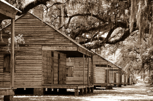 Nostalgic shot of a row of slave cabins at a Southern Louisiana plantation