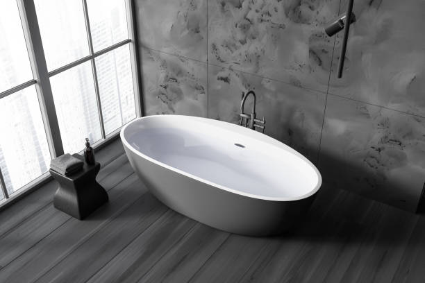 istock Gray marble bathroom interior with tub and window 1791191728