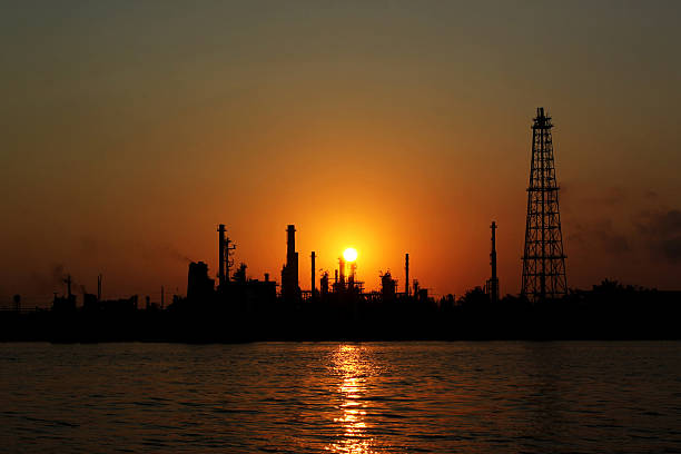 istock Oil refinery at sunrise 179119293