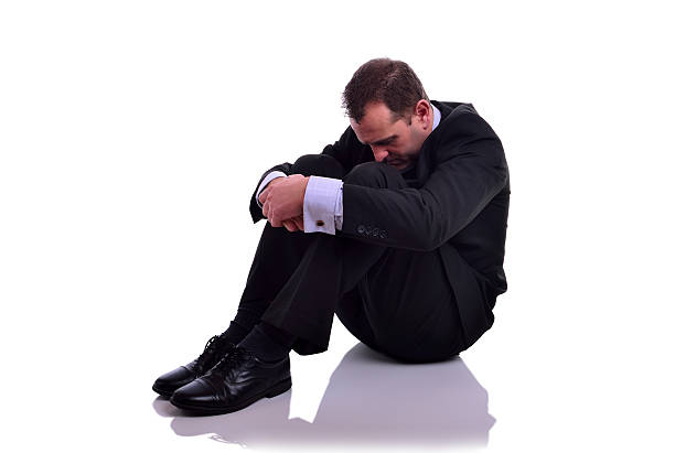 depressed businessman stock photo