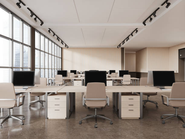 istock Beige business work zone interior with desk and computers, panoramic window 1791197200
