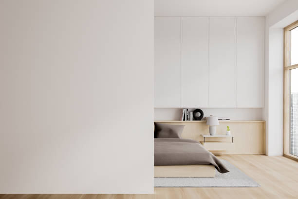 istock Stylish bedroom interior with bed and decoration, window. Mock up wall 1791197848