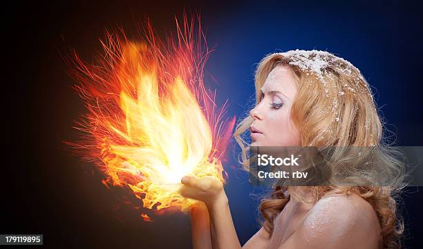 Frozen Girl Hold A Falme In Palms Stock Photo - Download Image Now - Ice, Hell, Fire - Natural Phenomenon