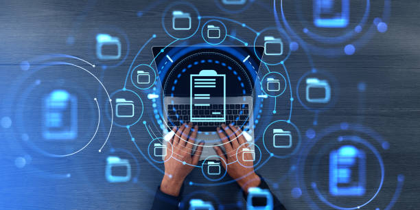 istock Businessman finger typing and document management system hologram 1791214683