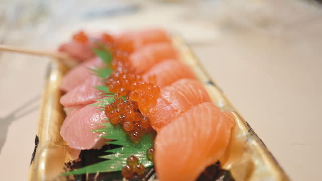 Take out set of tuna and salmon sashimi set at street food osaka japan