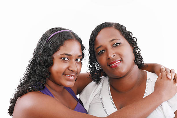 istock Mom with daughter looking at camera 179121558
