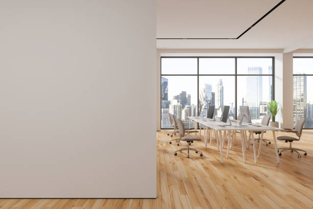 istock Stylish office interior with pc monitors and panoramic window, mock up wall 1791216329