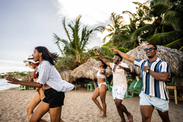 istock Young friends arriving at the beach 1791218511