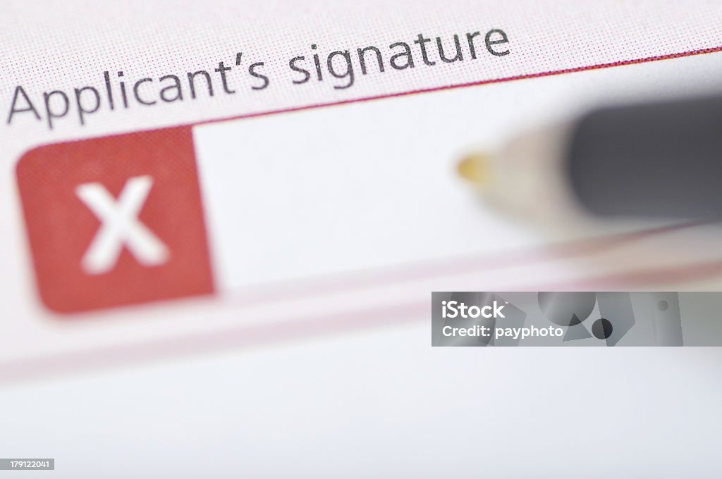 Signing a application form Agreement Stock Photo