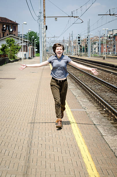 istock young beautiful hipster woman happy running 179122114