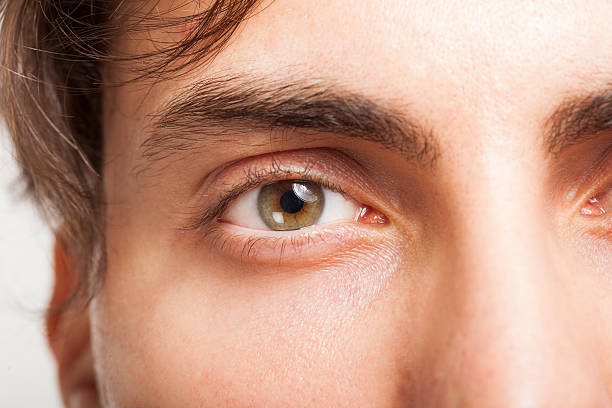 Man's eye Macro shot of a man's eye green eyes photos stock pictures, royalty-free photos & images