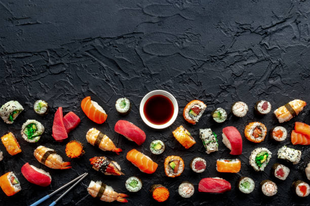 Sushi with chopsticks and soy sauce, with copy space. An assortment