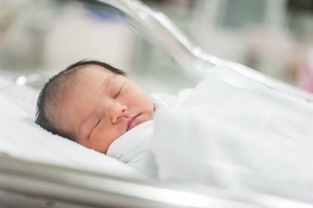 istock Sleeping baby in hospital 179123370