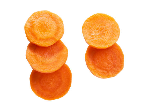 istock sliced carrots isolated on white background  top view. 1791242470