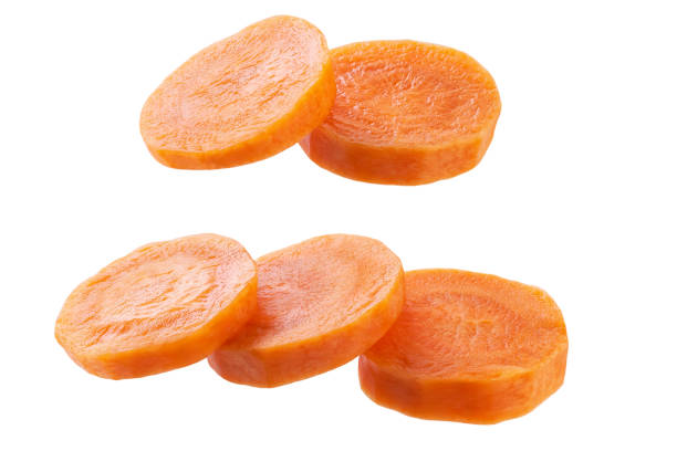 istock sliced organic carrots isolated on white background. sliced carrots. 1791242501