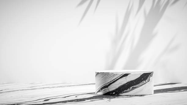 Marble pedestal on marble floor stock photo