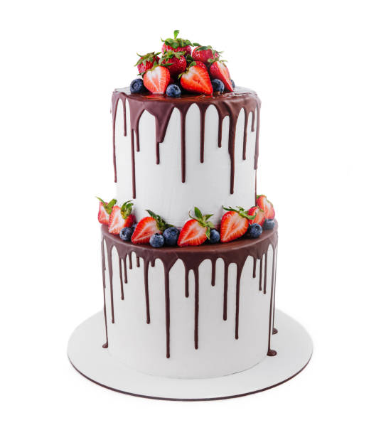 istock White cake with melted dark chocolate with fresh berries 1791242894