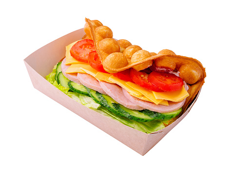 Belgian waffles with ham, cheese and salad on box