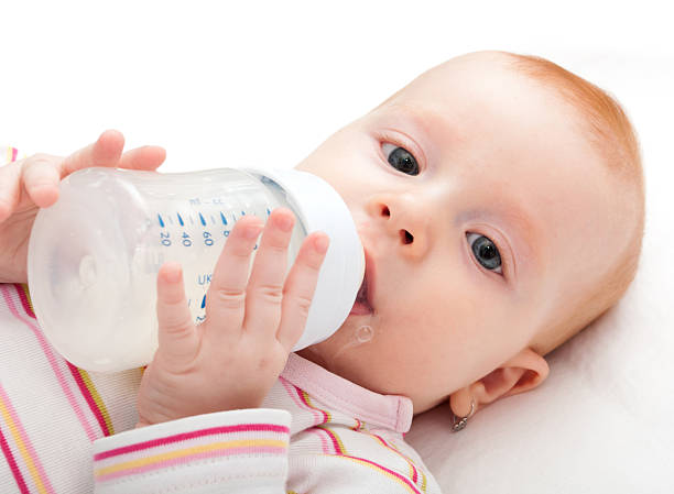 istock Eating Baby Girl 179124303