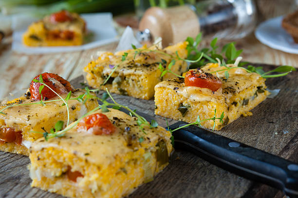 istock polenta with cheese cut into small squares on the board 179124561
